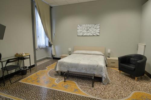 Postel nebo postele na pokoji v ubytování Check-Inn Rooms Genova Centro