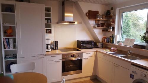 Una cocina o cocineta en Dorfquartier