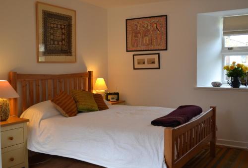 En eller flere senge i et værelse på Camlann