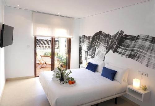 Postel nebo postele na pokoji v ubytování Mardenit Hotel Boutique