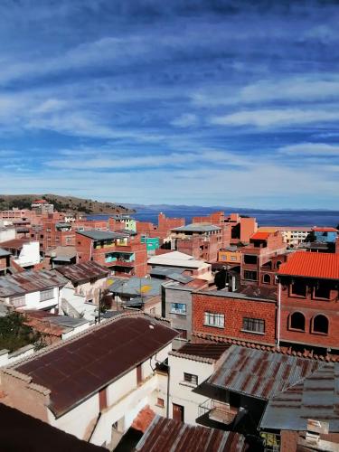 an aerial view of a city with buildings at Hostal Puerto Alegre in Copacabana