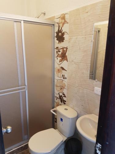Koupelna v ubytování Hotel Palmari