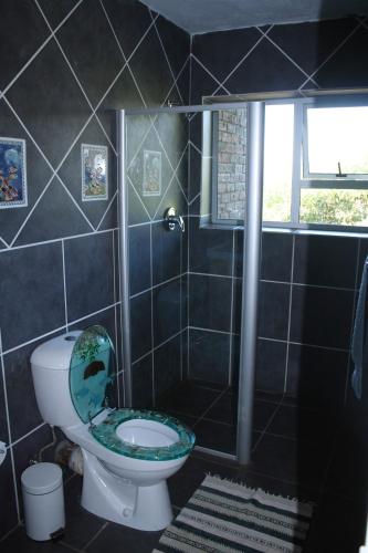 Ένα μπάνιο στο Columbus Guest House