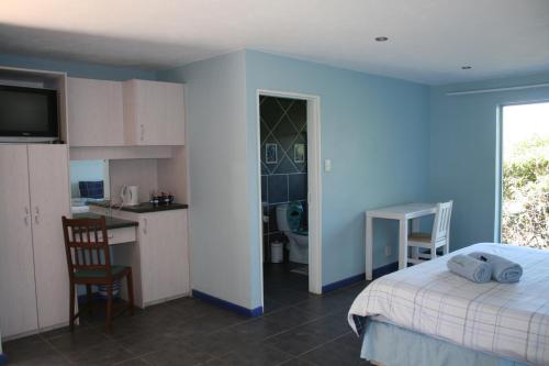 Η κουζίνα ή μικρή κουζίνα στο Columbus Guest House