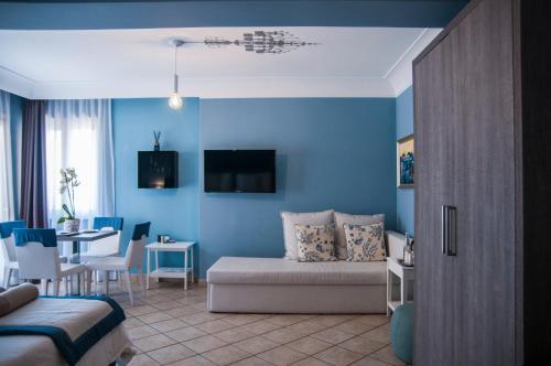 TV tai viihdekeskus majoituspaikassa Villa Le Terrazze Charming Rooms