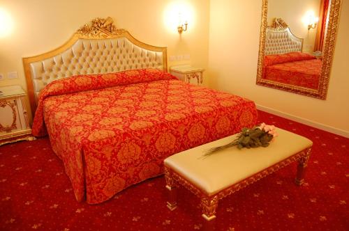 Ένα ή περισσότερα κρεβάτια σε δωμάτιο στο Hotel Motel Gold