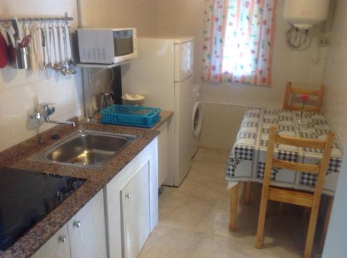 Kuchyň nebo kuchyňský kout v ubytování La Casita de la cruz