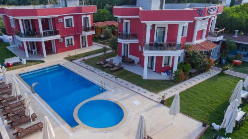 an aerial view of a house with a swimming pool at Cilek Butik Hotel in Cesme