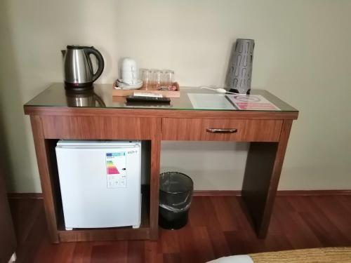 Kuchyň nebo kuchyňský kout v ubytování Ramparts Hotel