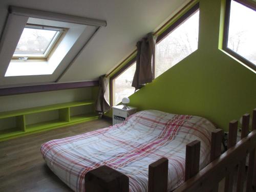 Voodi või voodid majutusasutuse Camping la Chevauchée toas