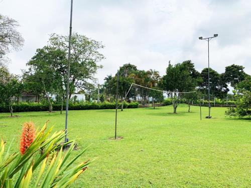 an empty park with a volley ball net at Finca Hotel Santana in Montenegro