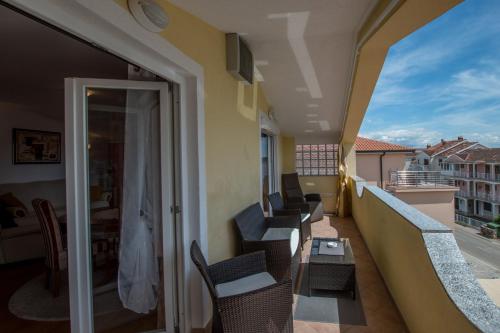 Balcone o terrazza di Apartments and Rooms PUNTA