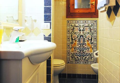 A bathroom at Acquamarina - Exclusive Sea House