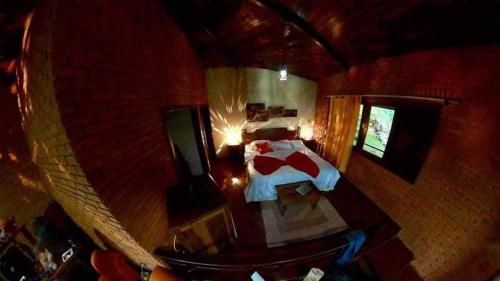 an overhead view of a bedroom with a bed at Vista Linda Hotel in Itatiaia
