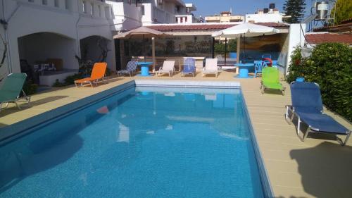 Bazén v ubytování Villas Irene 5 Family Apartments nebo v jeho okolí