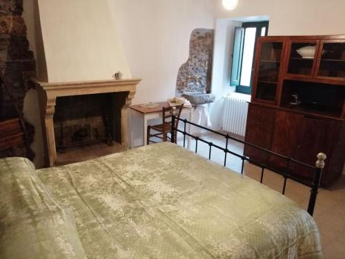 Postel nebo postele na pokoji v ubytování La casa di Duilia