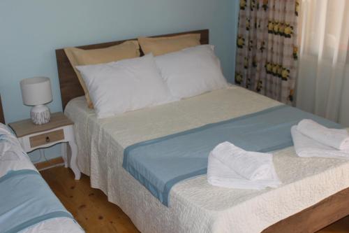 Katil atau katil-katil dalam bilik di Village House