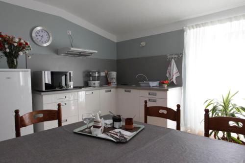 a kitchen with a table with a plate on it at Ondoria in Itxassou