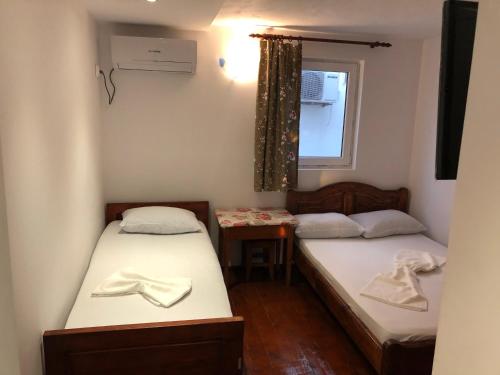 Katil atau katil-katil dalam bilik di Pension AMIRA