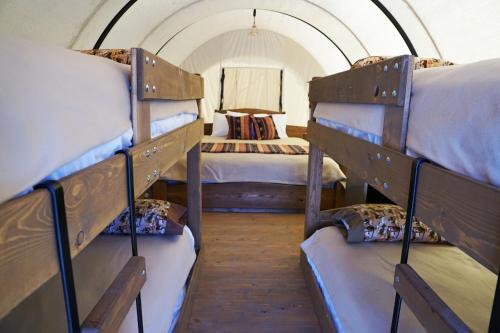 a group of bunk beds in a room at Orr Family Farm & RR, LLC in Oklahoma City