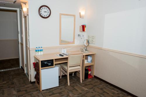 an office with a desk with a sink and a mirror at Toyoko Inn Daegu Dongseongro in Daegu