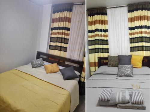 a bedroom with two beds with colorful curtains at at the ALs Place in San Nicolas