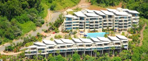 an aerial view of a resort with a swimming pool at Azure Sea Whitsunday Resort in Airlie Beach