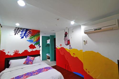 Una cama o camas en una habitación de Yu Huangshan Yan Homestay