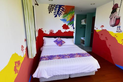 Una cama o camas en una habitación de Yu Huangshan Yan Homestay