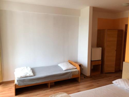 Postel nebo postele na pokoji v ubytování Rybitwa Karwia
