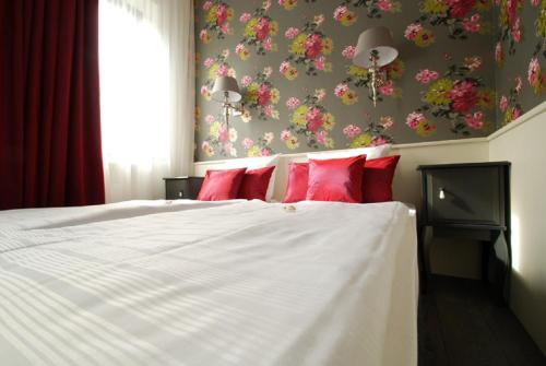 Кровать или кровати в номере Hotel Domspitzen