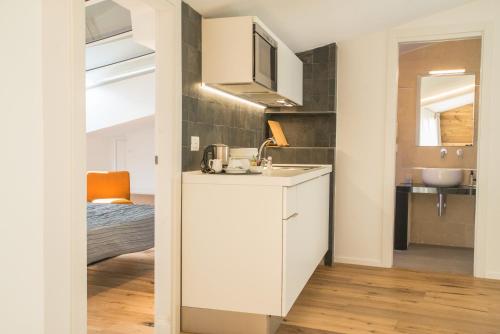 Kuchyňa alebo kuchynka v ubytovaní Re Dionisio Luxury Suites