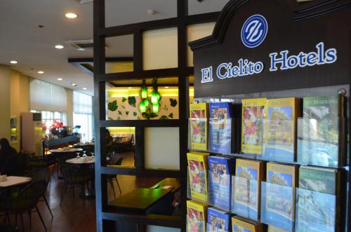 a book store with a display of books on the wall at El Cielito Inn - Sta. Rosa in Santa Rosa