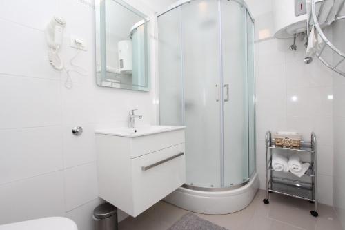 Kúpeľňa v ubytovaní Apartment Sorriso 2