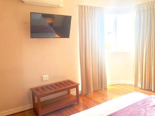 TV a/nebo společenská místnost v ubytování Lido Hotel