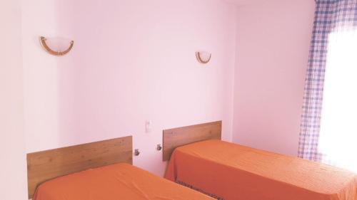 Postel nebo postele na pokoji v ubytování Res. Baie 18
