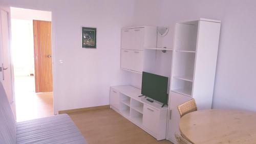TV a/nebo společenská místnost v ubytování Res. Baie 18
