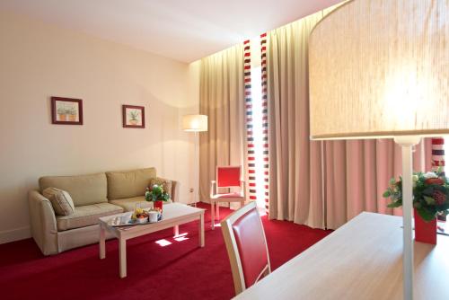 Χώρος καθιστικού στο Hôtel du Parc