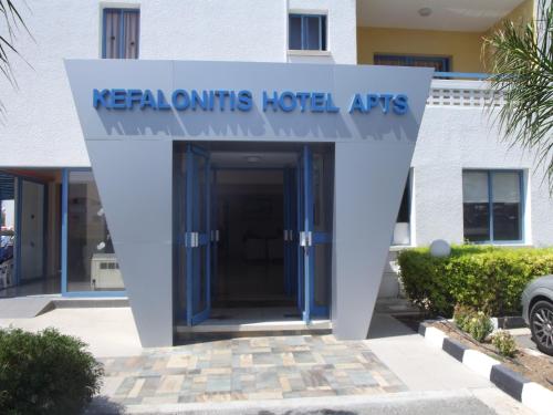 a building with a sign that reads regional units hotel arts at Kefalonitis Hotel Apartments in Paphos City