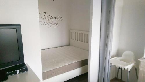 Postel nebo postele na pokoji v ubytování Wolke 5 - Urlaub in der Parkwohnanlage Atlantic