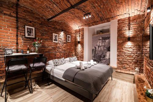 Voodi või voodid majutusasutuse DIETLA 99 APARTMENTS - IDEAL LOCATION - in the heart of Krakow toas