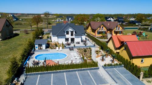 Bazén v ubytovaní Apartamenty Różany Ogród alebo v jeho blízkosti