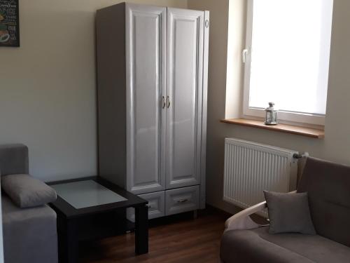 Posedenie v ubytovaní Apartament Pod Śnieżką