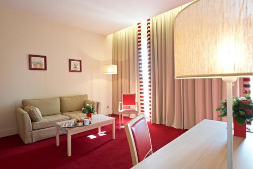 Χώρος καθιστικού στο Hôtel du Parc