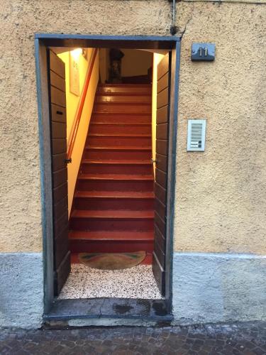 a set of stairs leading up to a building at Petit Bijou in Varenna