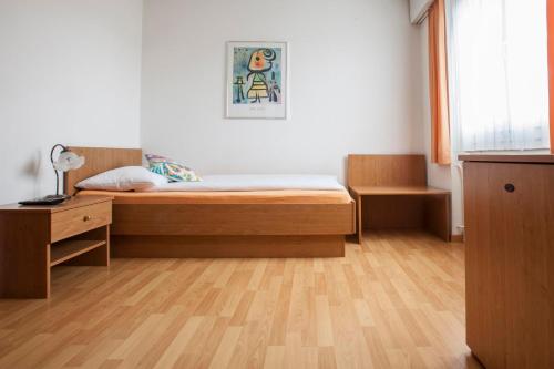 Postel nebo postele na pokoji v ubytování Hotel Zur Au