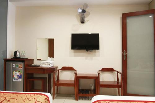 TV a/nebo společenská místnost v ubytování Ngoc Minh Hotel