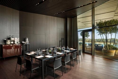 a conference room with a long table and chairs at Grand Park Hotel Rovinj by Maistra Collection in Rovinj