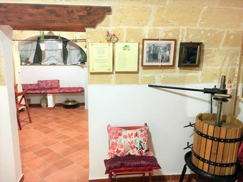 a view of a room with a chair and a drum at Patanella Wine in Spinazzola