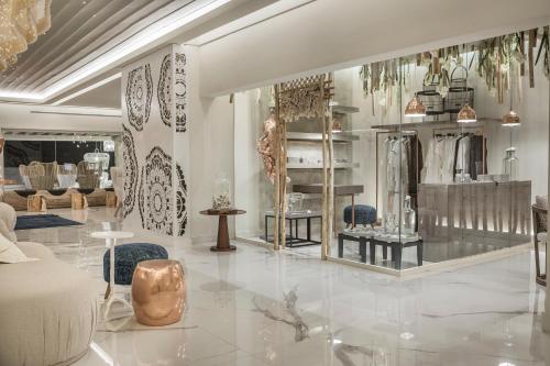 a fashion store with a lot of items on display at Palladium Hotel in Platis Yialos Mykonos